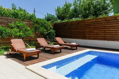 Image de Apartmani Bosa A3-vue sur la piscine