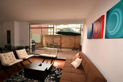 Image de Delia - 1 Br. Appartement exécutif avec terrasse privée avec barbecue