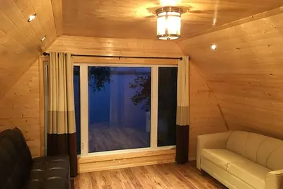 Image de Chalet de luxe au bord du lac sur 2 étages avec sauna infrarouge, piscine chauffée