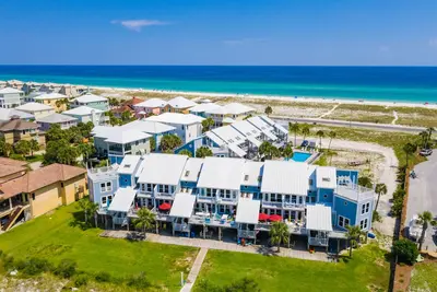 Image de Adorable condo à deux pas des eaux vert émeraude du golfe!