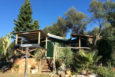 Image de Chalets de vacances indépendants, vues sur les plages locales. Bbq, hamacs, chaises longues.