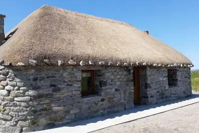 Image de Cottage côté plage imprégné d'histoire familiale, accepte les animaux, pour 4 personnes.