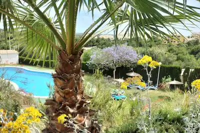 Image de Appartement spacieux de 2 chambres, 2 salles de bains, WiFi et A \/ C gratuits, grande piscine sur le complexe