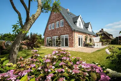 Image de Maison de vacances pour 7 personnes avec 150 m² à Oldsum (109337)