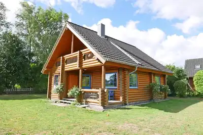 Image de Cabane en rondins 4 étoiles avec cheminée, WiFi et jardin pour 4 personnes