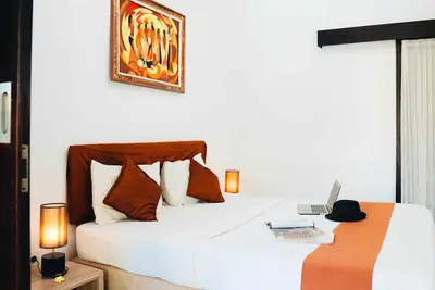Image de Près de l'aéroport! Maison d'hôtes 1 chambre à Kuta