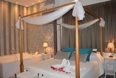 Image de Suite avec jacuzzi privé dans la chambre