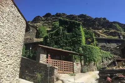 Image de Gite\" Le Cheval Blanc\" 70m2 fait de pierres et de bois (village ardoisiers)
