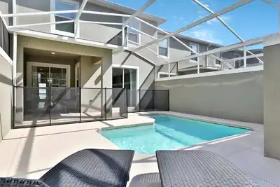 Image de Brand New Townhome 4 Bed on Champions Gate - jusqu'à 8 invités - 12 Miles de Wdw
