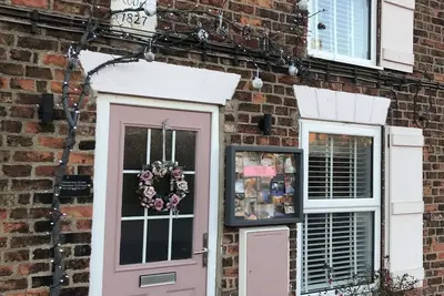 Image de Magnifique chalet avec bain à remous, WiFi, chien bienvenus, brûleur à bois,