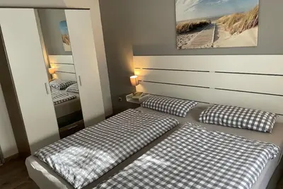 Image de Appartement de vacances Harlesiel pour 1 - 4 personnes avec 2 chambres à coucher - Appartement de va