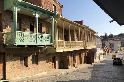 Image de HĂ´tel avec 5 chambres, 5 salles de bain, cuisine, salon + balcon avec une vue magnifique