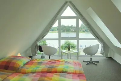 Image de Appartement 5 étoiles avec Schleiblick fantastique, terrasse et Wifi pour les familles