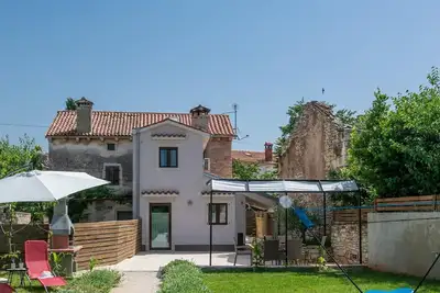 Image de Maison de vacances Rakalj pour 1 - 6 personnes avec 3 chambres à coucher - Maison mitoyenne
