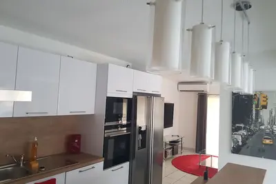 Image de Appartement Arcaim, 90 m², climatisé, 4 chambres à 200 mètres de la plage