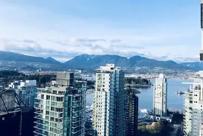 Image de Vancouver Downtown Coal Harbour Condo avec vue panoramique sur l'océan