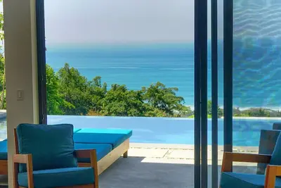 Image de The Rock House: superbe maison de luxe avec vue sur l'océan et piscine privée à débordement