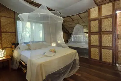 Image de Amami Beach Resort, style indigène à 20 mètres du bord de mer