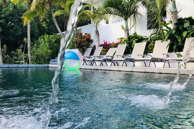 Image de Palm Cottages - Le Palm Cottage - Oasis Tropical Lush