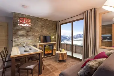 Image de Appartement Confortable pour la Famille + Cheminée | Superbe pour Vos Prochaines Vacances de Ski