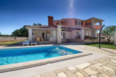 Image de Maison de vacances Barbariga pour 1 - 9 personnes avec 4 chambres à coucher - Maison de vacances