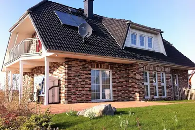 Image de Haus Strandläufer Appartement confortable au premier étage près de la plage