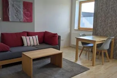 Image de Appartement confortable de 50 m² avec balcon, parking gratuit et connexion Wi-Fi, petit-déjeuner buffet et cuisine entièrement équipée