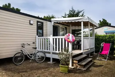 Image de Mobilhome Grand Confort 27m² \/ 2 chambres - terrasse couverte 5 à 6 personnes - 5 pers. inclus dans le tarif