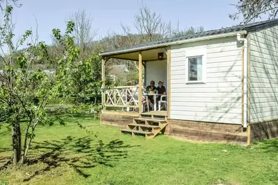 Image de Chalet Komfort 30 m2 (2 Schlafzimmer) + Tv + überdachte Terrasse 4 Personen