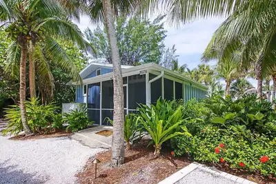 Image de The Beach House 2 chambres / 2 salles de bain en front de mer