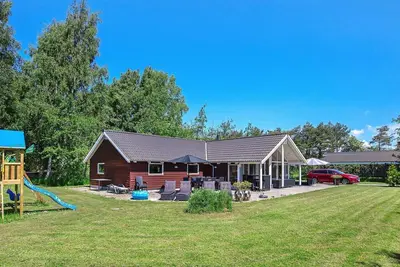 Image de Maison de vacances pour 10 a Væggerløse-By Traum
