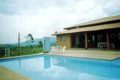 Image de Chacara 4 chambres, piscine et verdure - 1 suite