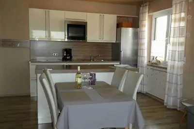 Image de Geräumige 90qm Ferienwohnung mit Balkon und Terrasse, kostenfreies Wlan