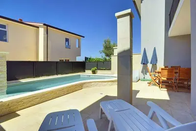 Image de Appartement de vacances avec piscine et climatisation