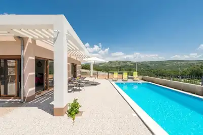 Image de Maison de vacances Dugopolje pour 1 - 8 personnes avec 3 chambres à coucher - Maison de vacances