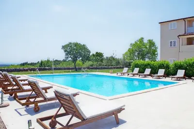 Image de Appartement de vacances Rakalj pour 1 - 4 personnes avec 2 chambres à coucher - Appartement de vacan