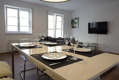 Image de Appartement moderne de 60 m² avec terrasse et balcon, proche du centre