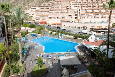 Image de Appartement à Castle Harbour, piscine chauffée, piscine et vue sur la montagne