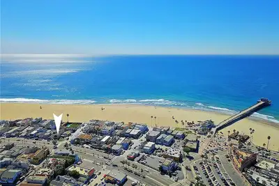 Image de Maison de plage de 5 chambres avec terrasse sur le toit