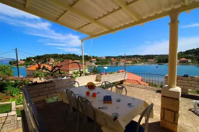 Image de Apartments Radojković Lumbarda - Appartement 2 Chambres Confort avec Terrasse et Vue sur la Mer (A2)