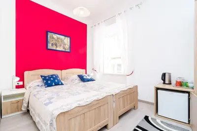 Image de Chambres Tezoro - Chambre Triple Confort avec Vue sur la Ville - C7