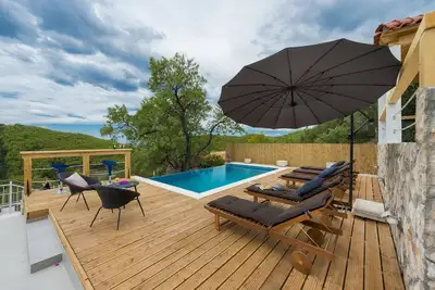 Image de Villa Dundo Pero - Villa 4 chambres avec piscine et vue mer