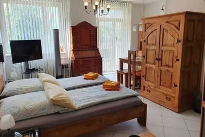 Image de Appartement exclusif dans le style sud-américain du pin dans le centre de Berlin