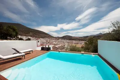 Image de Casita avec superbe vue, piscine privée, airco au centre des villages blancs