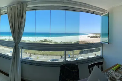 Image de Ajustement merveilleux. en face de Praia Grande avec vue imprenable!