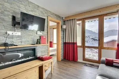 Image de Spacieux 2 pièces avec accès pistes, terrasse, cheminée et parking