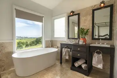 Image de Boutique Holiday Cottages donnant sur Byron Bay