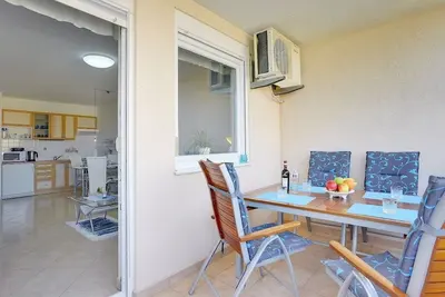 Image de A seulement 400 mètres de la plage avec machine à laver, Wlan, air conditionné