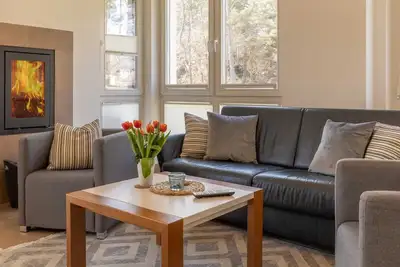 Image de Fantastique appartement avec sauna et cheminée