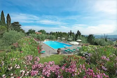Image de Casa Canarino B: Un charmant appartement entouré de verdure.